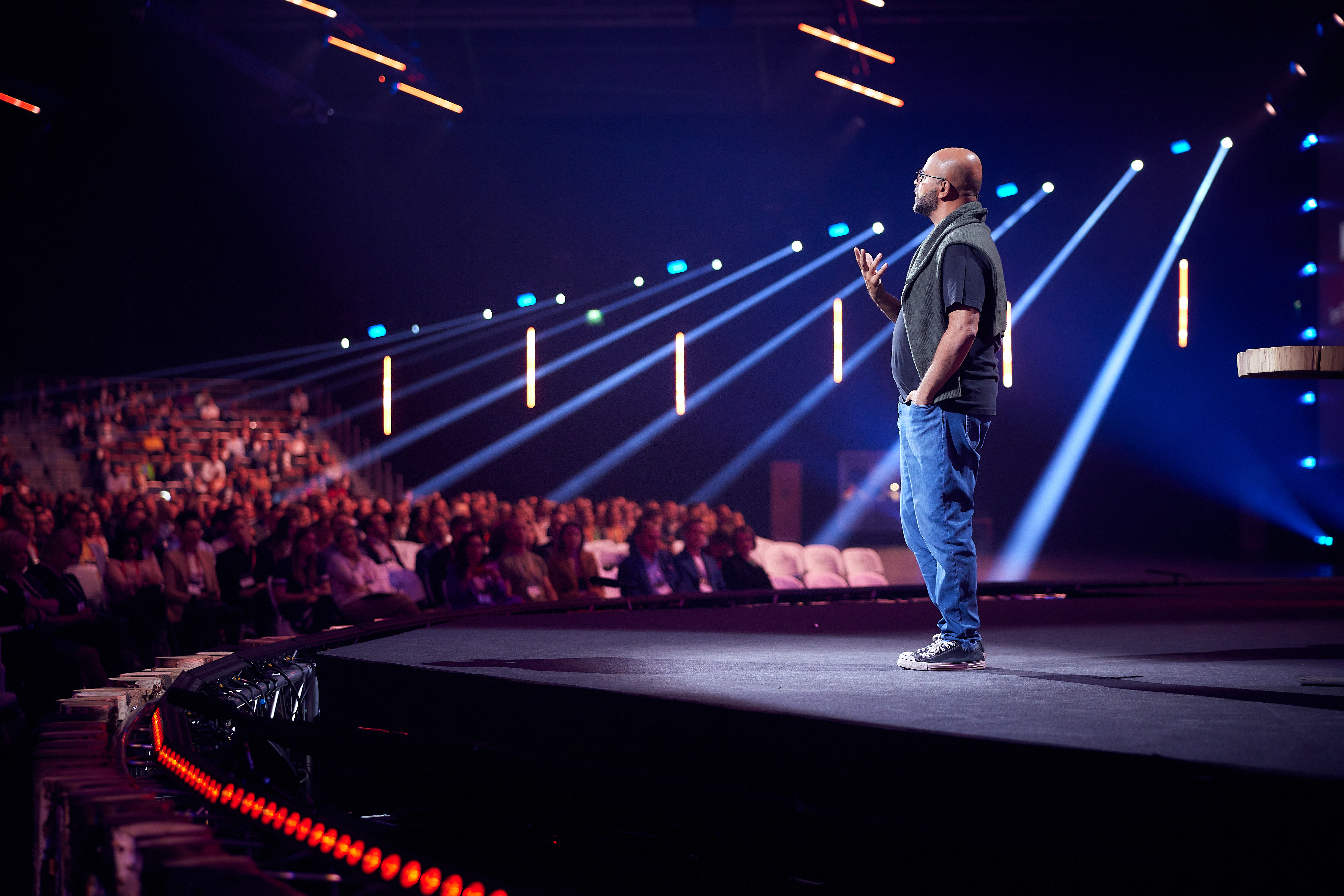 Mo Gawdat speaking on stage